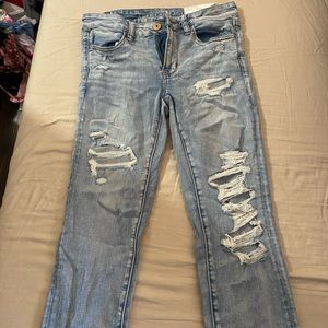 American Eagle Jeggings NWT. Next level stretch, very cute distressed.